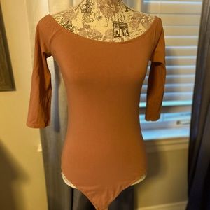 Express terracotta colored body suit off the shoulder size medium